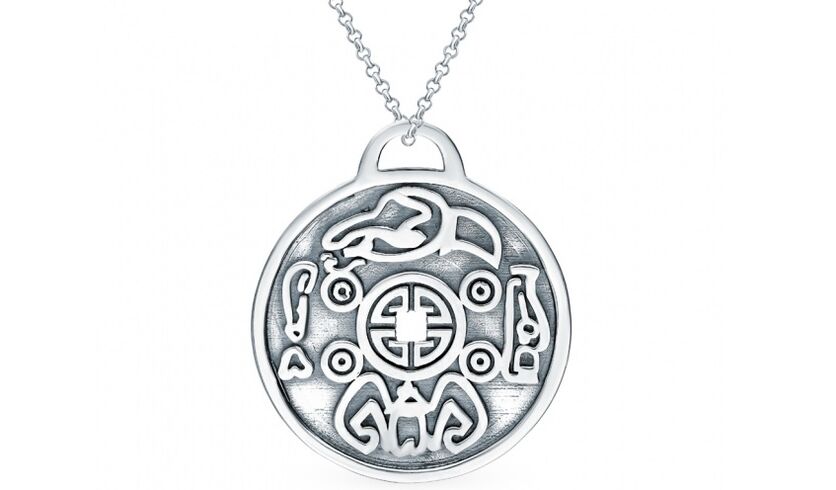 silver coin as good luck amulet