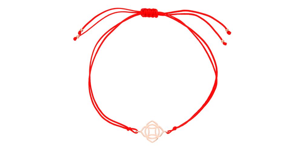 amulet with a red thread for good luck